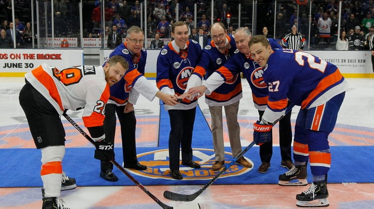 The sons of former New York Islanders general manager Bill...