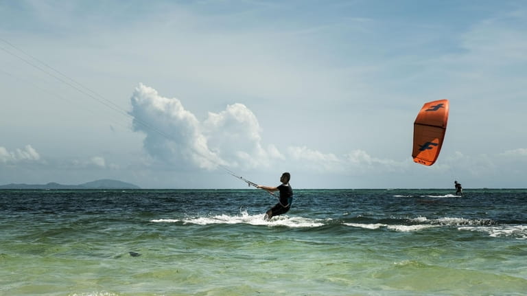 Kiteboarding enthusiasts in Boracay, an island in the Philippines.