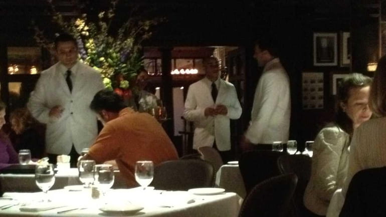At Hendrick's Tavern in Roslyn, waiters wear crisp white jackets....