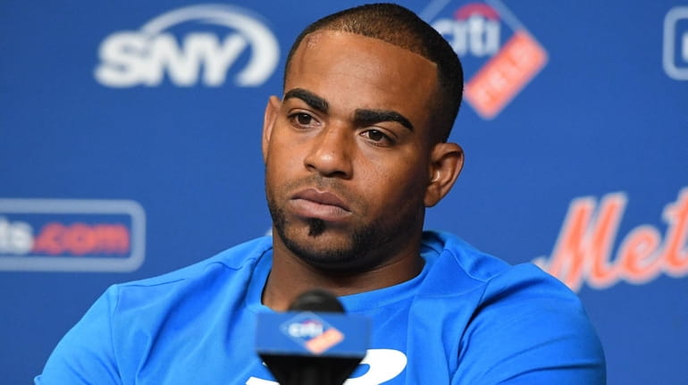 The Mets' Yoenis Cespedes looks on during a press conference at...