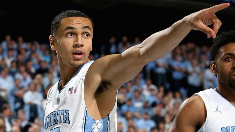 Marcus Paige of the North Carolina Tar Heels reacts during...