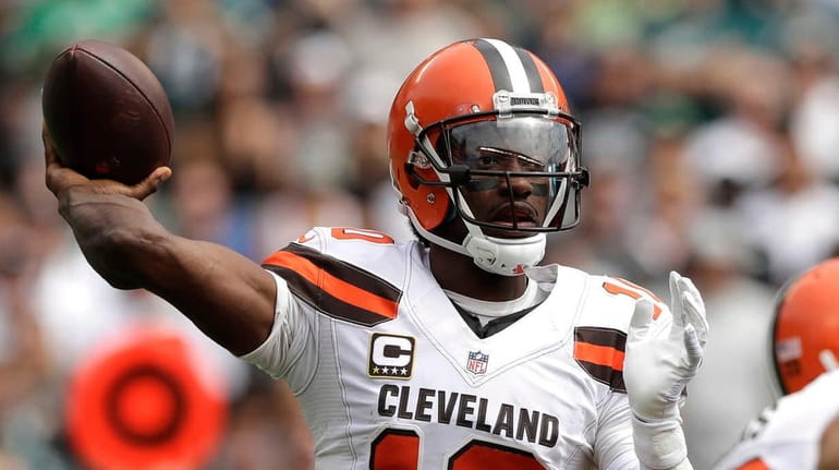 Cleveland Browns' Robert Griffin III passes during the first half...