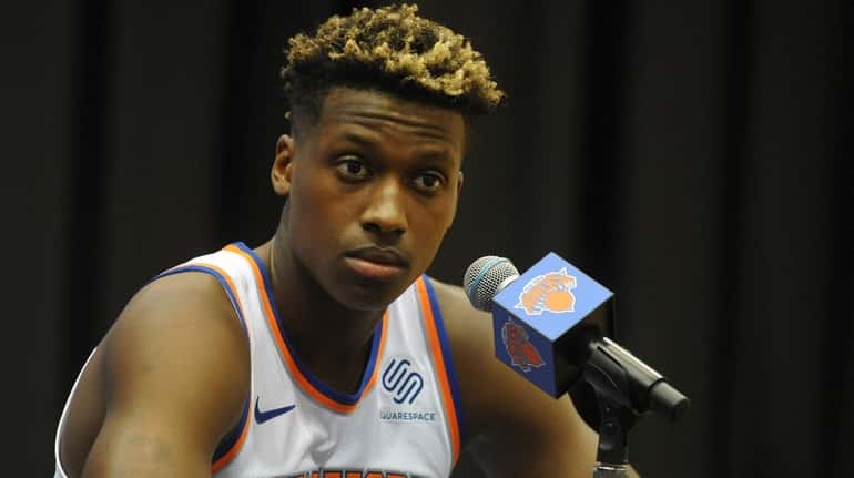 Frank Ntilikina of the Knicks fields questions during the team's...