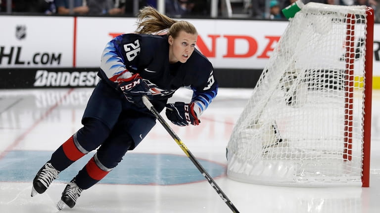 United States' Kendall Coyne Schofield skates during the Skills Competition,...