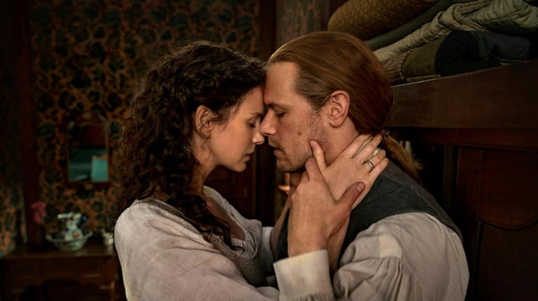 Claire Randall (Caitriona Balfe) and Jamie Fraser (Sam Heughan) in...