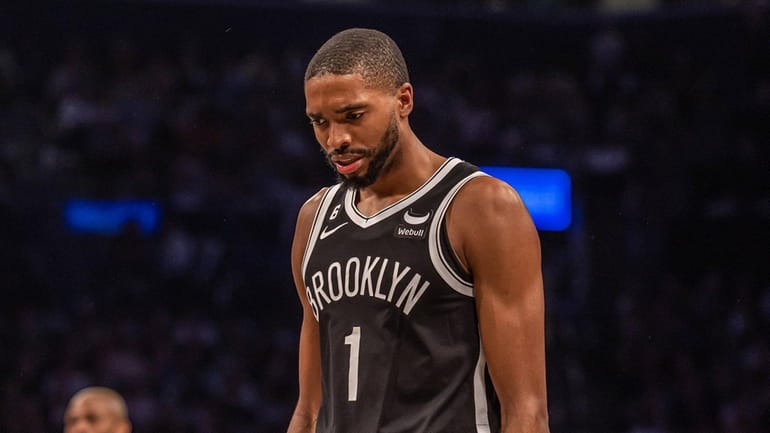 Nets’ Mikal Bridges looks on near the end of Game...