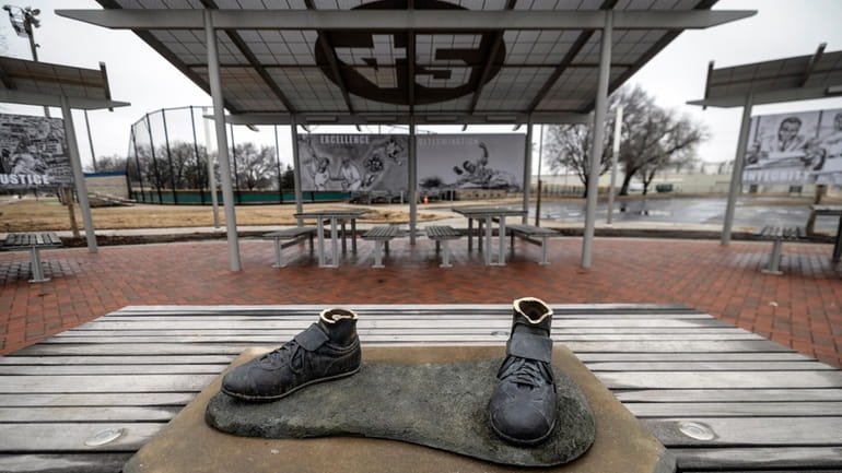 A bronze statue of legendary baseball pioneer Jackie Robinson was...