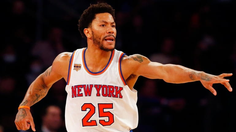 Derrick Rose reacts during the second half against the Philadelphia 76ers...
