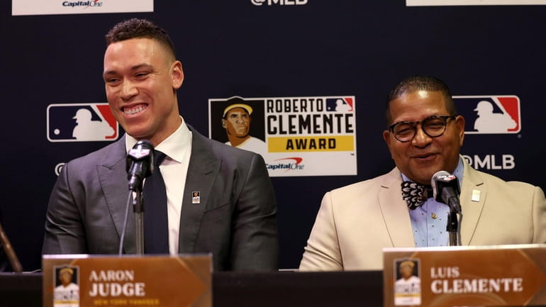 Aaron Judge of the Yankees and Luis Clemente speak to the...
