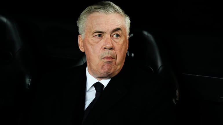 Real Madrid's head coach Carlo Ancelotti takes his seat on...