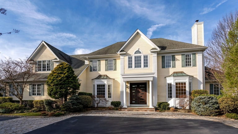 Priced at $2.99 million, this Colonial on Wildwood Drive features...