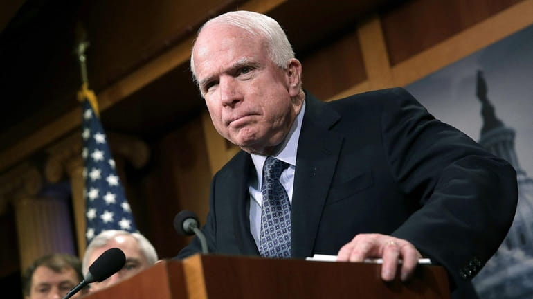 Sen. John McCain (R-Ariz.) speaks during a news conference at the...
