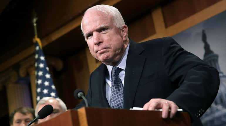 Sen. John McCain (R-Ariz.) speaks during a news conference at the...