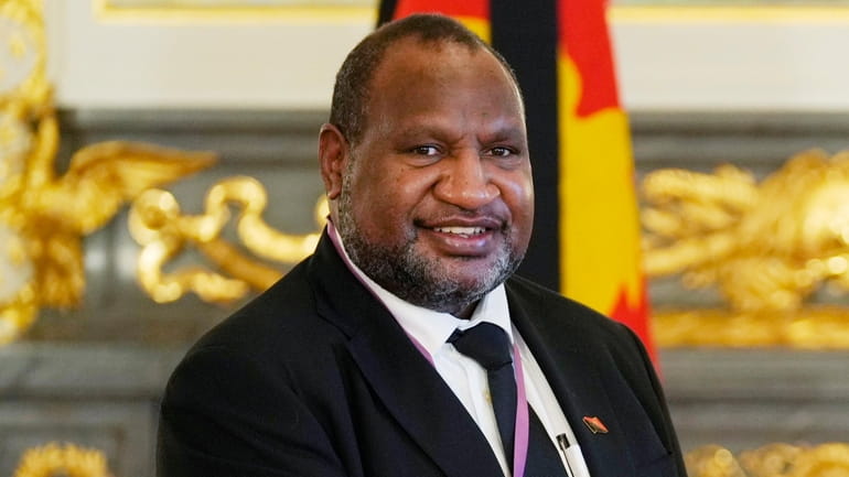 Papua New Guinean Prime Minister James Marape poses for a...