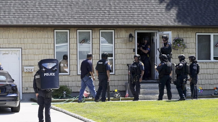 The Suffolk County Police raided a house in West Islip.
