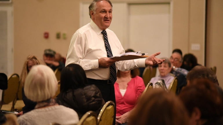 Nassau County comptroller George Maragos speaks during a community meeting...