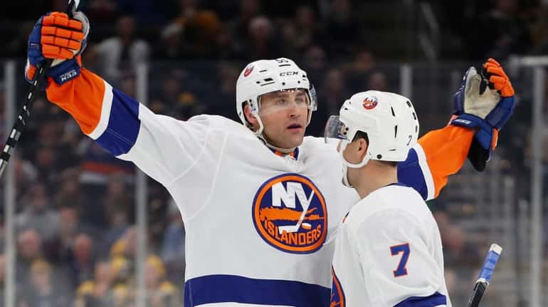 Johnny Boychuk #55 of the New York Islanders celebrates with...