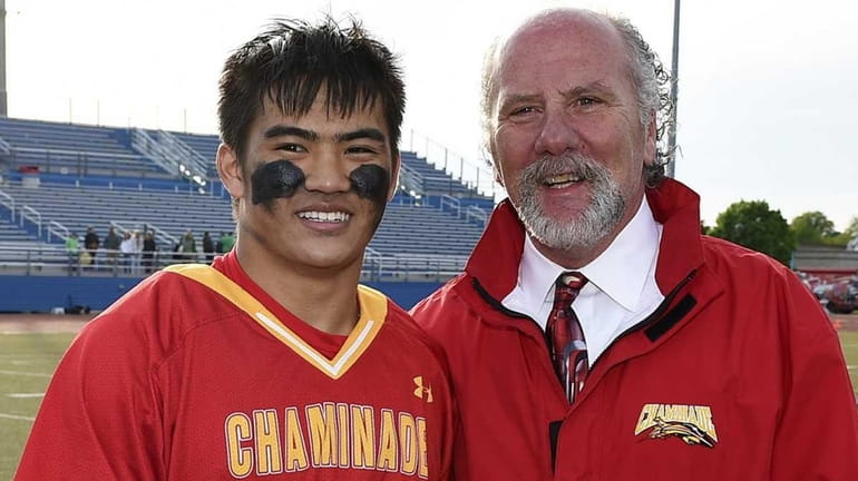 Chaminade attacker Brendon Luu is presented the MVP award by...
