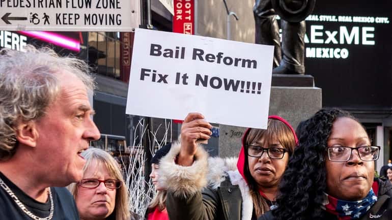 Activists take part in a protest over New York State bail...