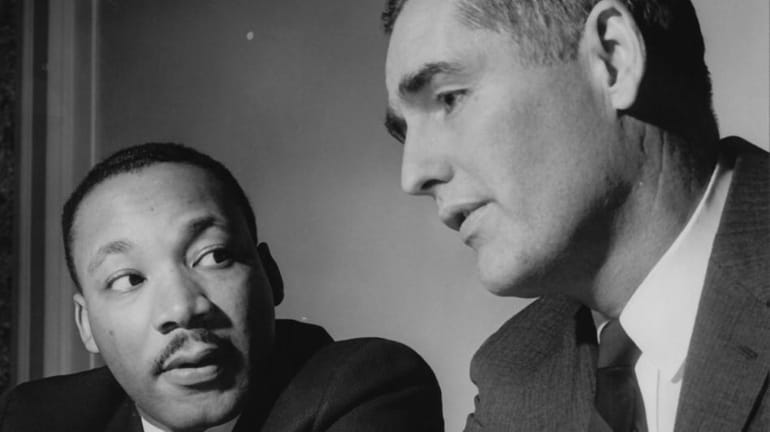 Dr. Martin Luther King talks with Nassau County Executive Eugene...