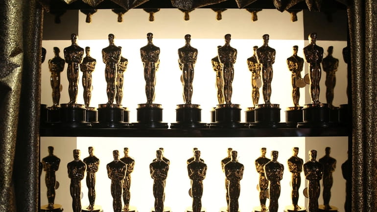 Oscar statuettes appear backstage at the Oscars at the Dolby...