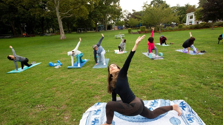 Thalia Gavriel leads a yoga class on Sunday morning at...