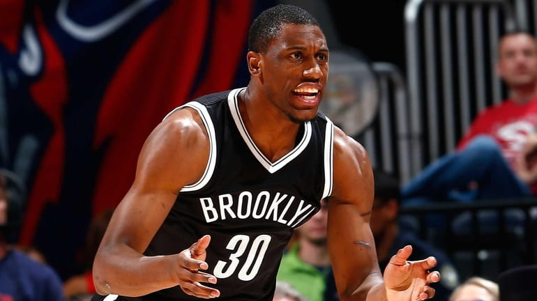 Thaddeus Young of the Brooklyn Nets reacts after being charged...