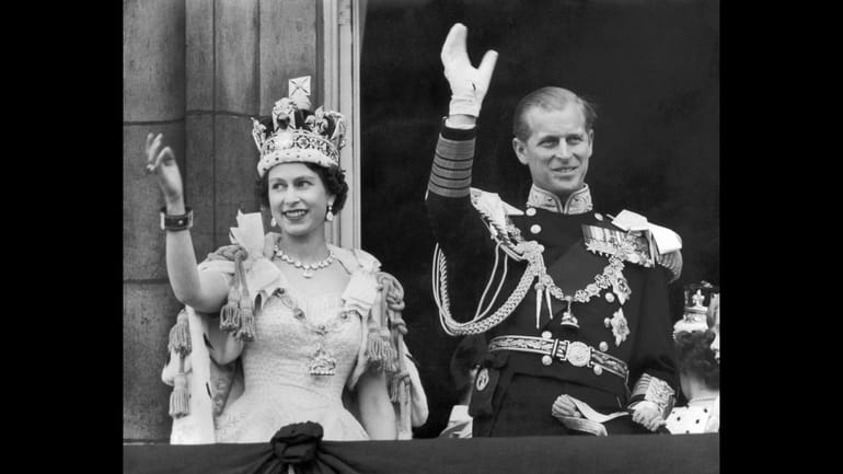 Queen Elizabeth and her husband, the Duke of Edinburgh, at...