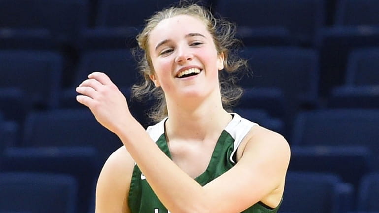 Payton Tini of Locust Valley reacts as her team closes in...