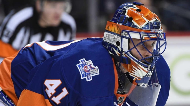 New York Islanders goalie Jaroslav Halak looks on against the...