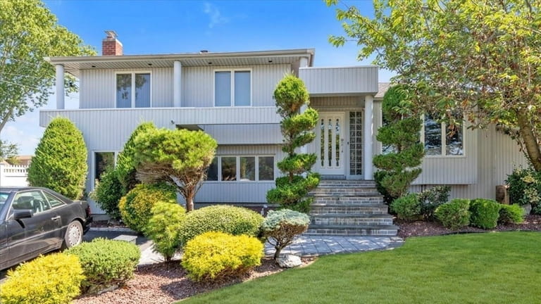 Priced at $699,000, this split-level on Navy Court features a...