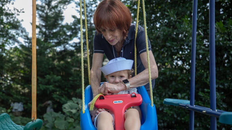 Helene Rudin at the playset with grandson Jack River Rudin in...