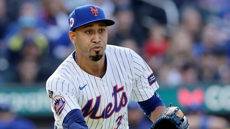 Edwin Diaz #39 of the New York Mets flips the...