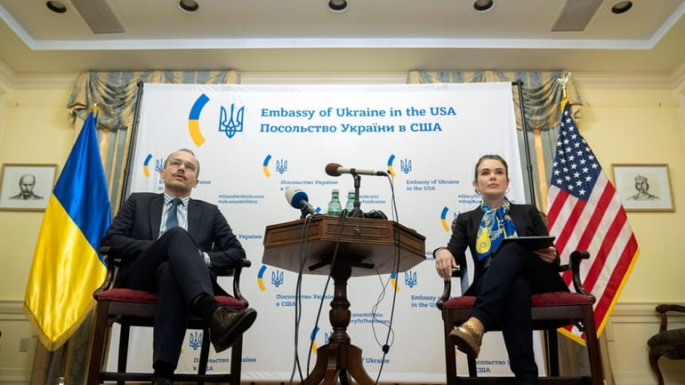 Ukraine's Minister of Justice Denys Maliuska, left, and Deputy Minister...