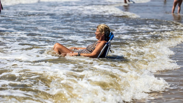 Lisa Epstein at Jones Beach on Monday. Beachgoers were urged to stay...