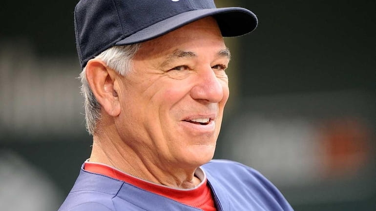 Manager Bobby Valentine watches batting practice before the game against...
