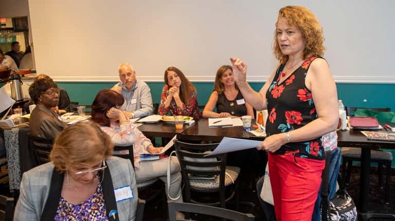 Stephanie Larkin leads a discussion at the Long Island Breakfast Writers...