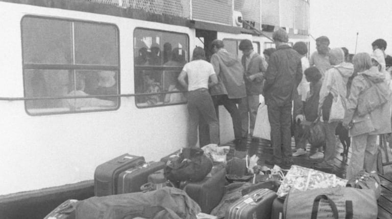 Luggage piled on a Point O'Woods dock in the summer of 1976...