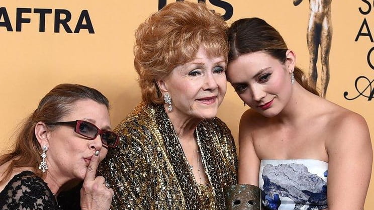 Carrie Fisher, from left, Debbie Reynolds and Billie Lourd at...