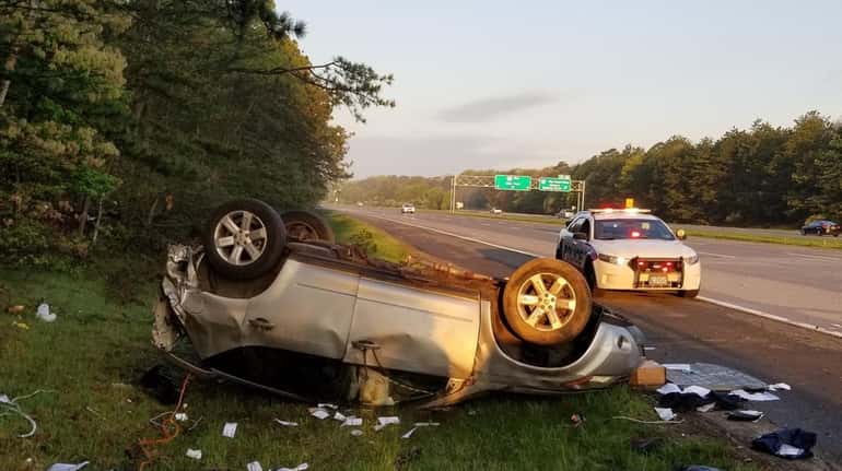 An SUV overturned after crashing Friday on the eastbound Long...