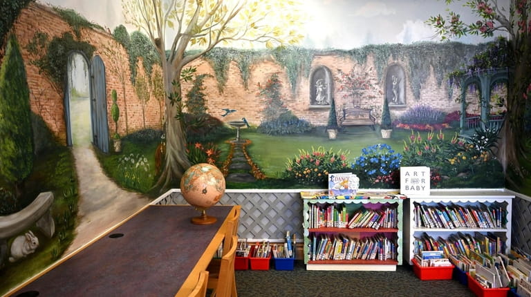 Murals in the Manhasset Public Library Children's Room celebrate "The...