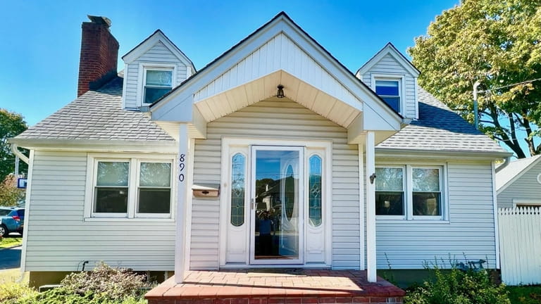 Priced at $679,000, this updated Cape on Oyster Bay Road...