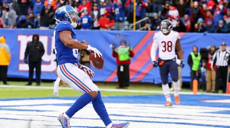 Sterling Shepard celebrates a third-quarter touchdown against the Chicago Bears...