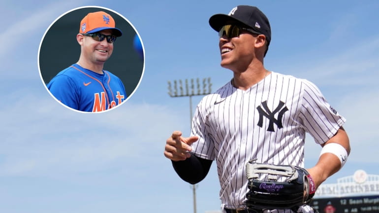 Yankees slugger Aaron Judge, right, and Mets manager Carlos Mendoza.