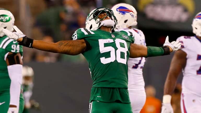 Darron Lee #58 of the New York Jets reacts after...