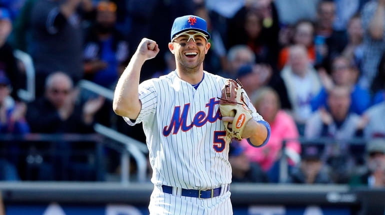 David Wright #5 of the New York Mets reacts after...