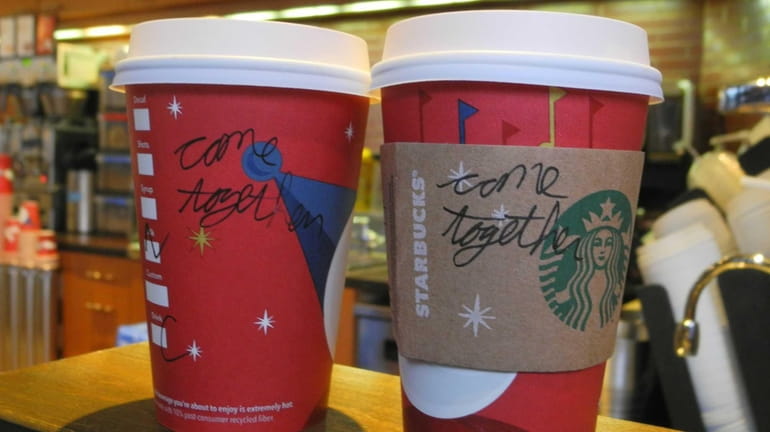 The phrase "come together" is written on a coffee cup...