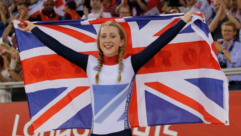 Britain's Laura Trott celebrates after winning the gold medal in...