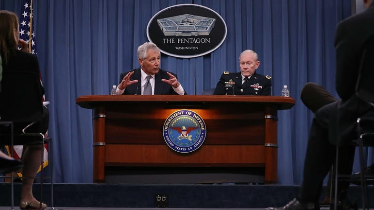 Secretary of Defense Chuck Hagel and Chairman of the Joint...