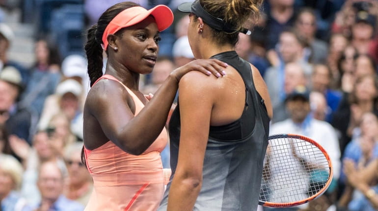 Sloane Stephens rand Madison Keys hug one another after the...